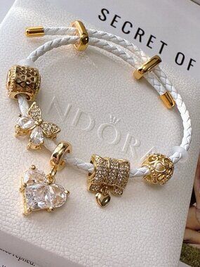 Pandora White Braided Bracelet with Gold & Crystal Charms